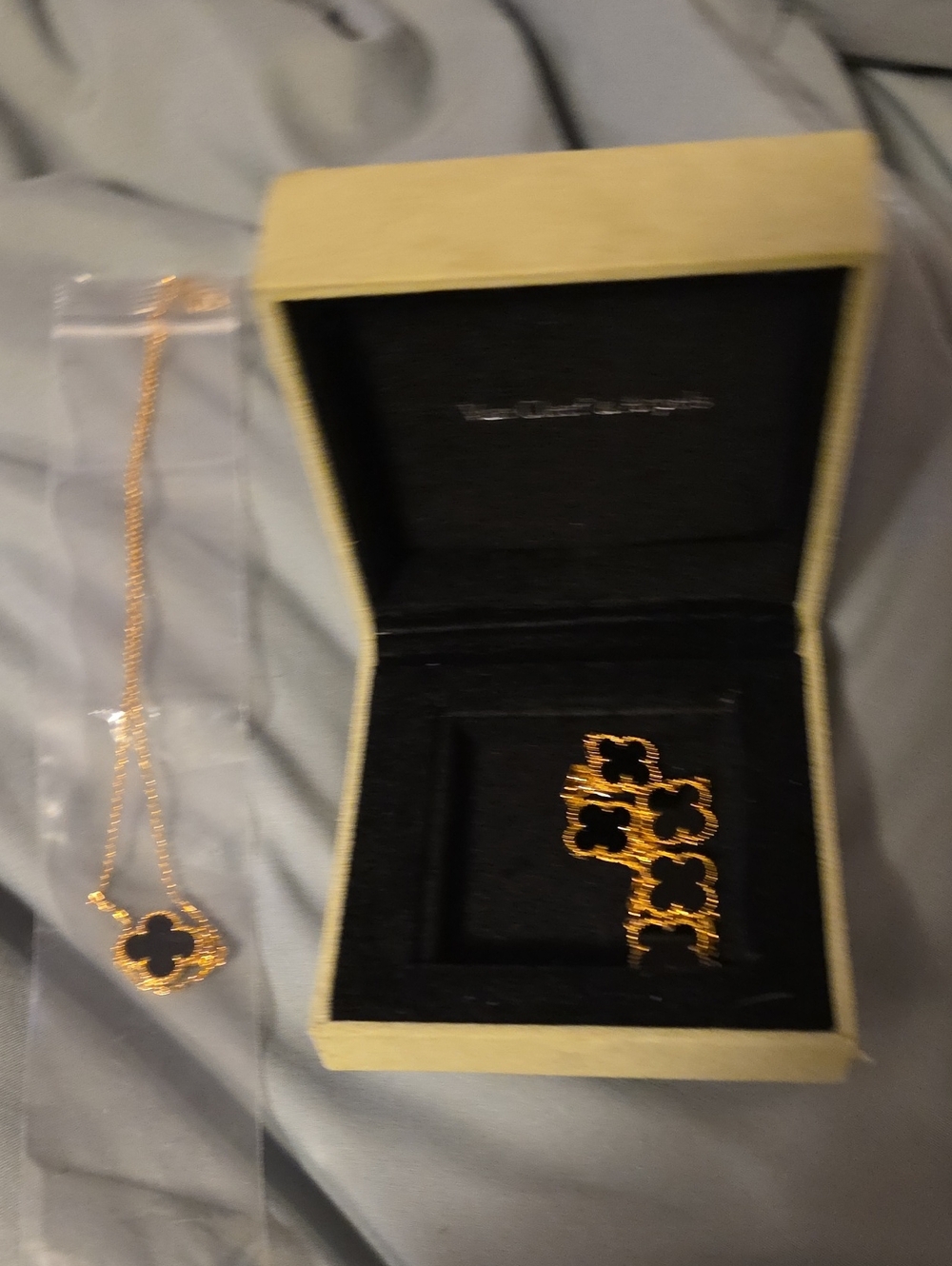 Gold-Tone Necklace with Black Clover Pendant by
